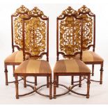 A set of four hall chairs by Jonathan Charles, with pierced and gilt back panels,