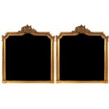 A pair of gilt framed overmantel mirrors, the crests with shell and scroll decoration,