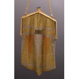 A tri-colour 9ct gold chainmail purse, retailed by Asprey, import marks for London 1924,