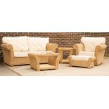 A wicker two-seater sofa, an armchair,