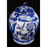 A Chinese blue and white jar and cover, 20th Century, modelled as a melon, decorated mandarin ducks,