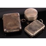 An Edwardian silver vesta case, Samuel Mordan & Co, Chester 1907, another smaller vesta,