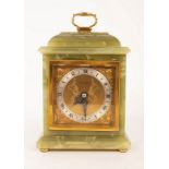 An onyx cased mantel clock, the square dial signed Bright & Son Ltd, Scarborough,