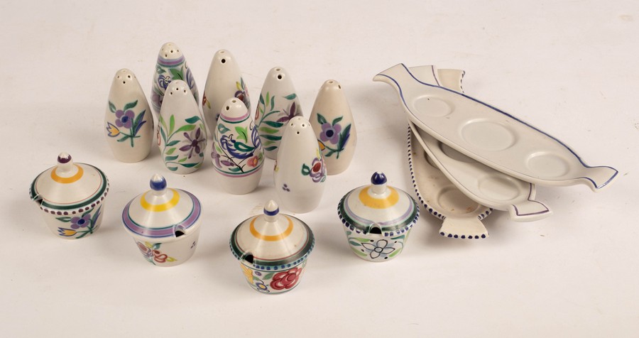 Poole Pottery, three cruets each comprising a salt pot, a pepper pot,