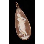 A pear-shaped cameo depicting a Classical figure of a woman, in a gold mount, 4.