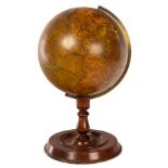 An early Victorian Crutchley's new terrestrial globe with brass meridian scale,