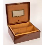 A mahogany cedar lined cigar humidor by Dunhill of London, with lock and key,