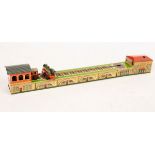 A push pull clockwork train and carriage with 16cm track and turntable,