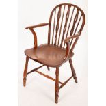 A Windsor type armchair with pierced splats and dished elm seat CONDITION REPORT: