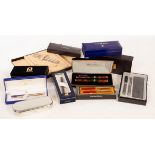 A collection of pens including Parker, Sheaffer,