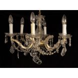 A six-light chandelier with baluster central column and scroll arms, 30.