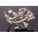 A Victorian diamond brooch of flower form, 3.4cm long, approximately 4.