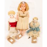 Two bisque head dolls and a wax head doll CONDITION REPORT: Condition information is