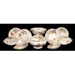 A French porcelain botanical dinner service bearing a French retailers stamp,