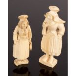 A carved ivory bodkin case, modelled as a standing woman holding a basket of flowers,