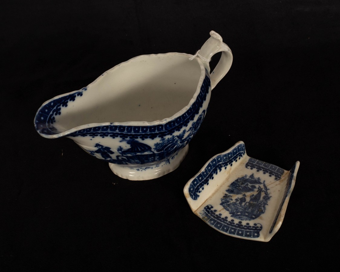 An 18th Century Worcester blue and white fisherman pattern sauce boat, 16.