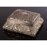 An embossed silver trinket box, William Comyns, London 1912, decorated birds and C-scrolls,