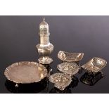 A silver octagonal sugar caster, R S, Sheffield 1933, four pierced sweetmeat dishes and a salver,