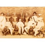 Types of Employees in an Opium Factory/a group of shirtless Indians and seven white suited