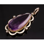 An Edwardian amethyst, diamond and white enamel pendant,