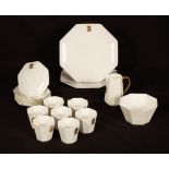 A Wedgwood white tea service of seventeen pieces with gilt monogram and handles CONDITION