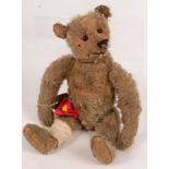 A teddy bear, circa 1920s,