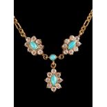 A 14ct yellow gold curb link necklace with a turquoise and paste set floral design approximately