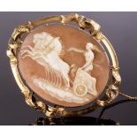 A Victorian shell cameo brooch depicting a charioteer on a cloud,