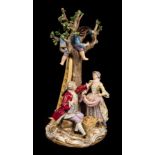 A Meissen group depicting apple pickers, late 19th Century,