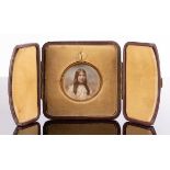 A circular photographic portrait in a 9ct gold frame,