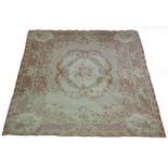 A modern Aubosson style carpet with central floral cartouche,