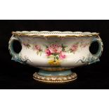 A Royal Worcester twin-handled rose bowl with painted flowers, the handles moulded with leafy stems,