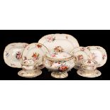 A Coalport part dinner service, painted with summer flowers in the style of William Billingsley,