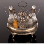 A George III silver oval cruet, Charles Chesterman 1807, with central handle and beaded border,