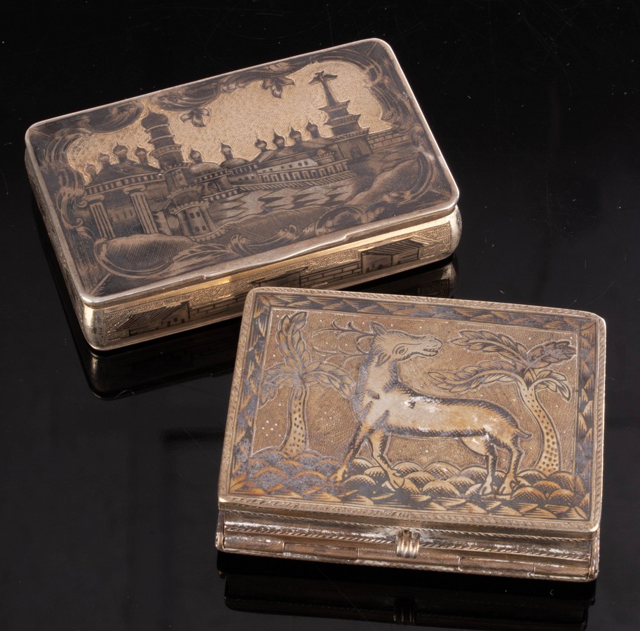 A Russian silver snuff box, 84 HK, the cover with niello decoration of buildings,