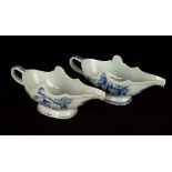 Two Chinese blue and white porcelain gravy boats, 19th Century, decorated figures in landscapes,