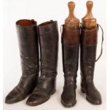 Two pairs of riding boots,
