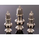 A set of three George II baluster-shaped silver casters, Samuel Wood, London 1733,