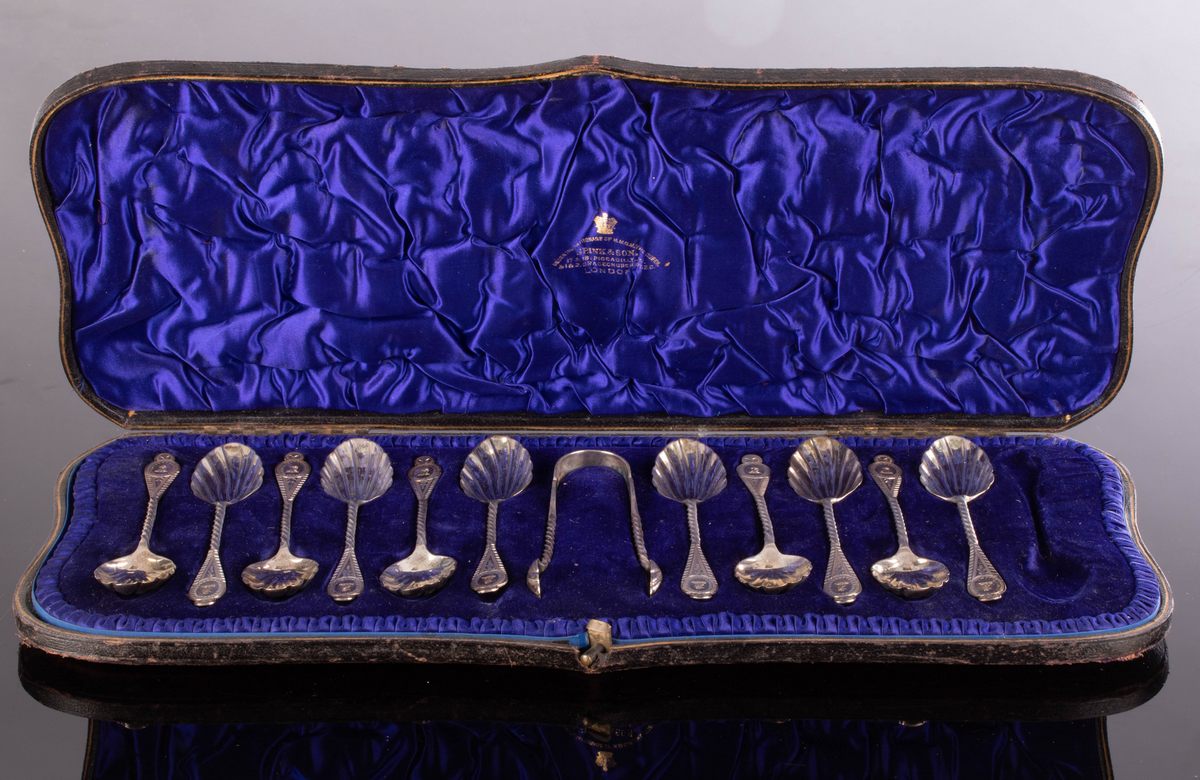 A set of eleven Victorian silver teaspoons and the matching sugar tongs, Wakely & Wheeler,