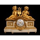 A French 19th Century ormolu and marble half-hour strike, eight-day mantel clock,