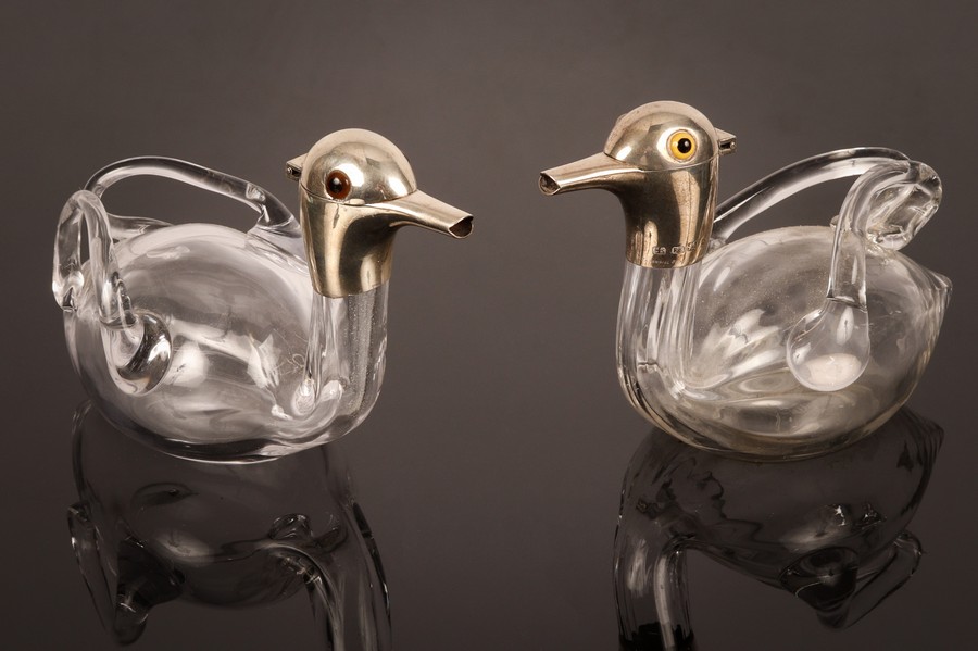 A pair of Victorian silver mounted spirit decanters,
