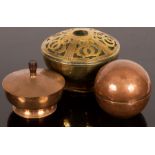 A spherical copper string box, etched signature to the base John Rigg 1902, 12cm diameter,