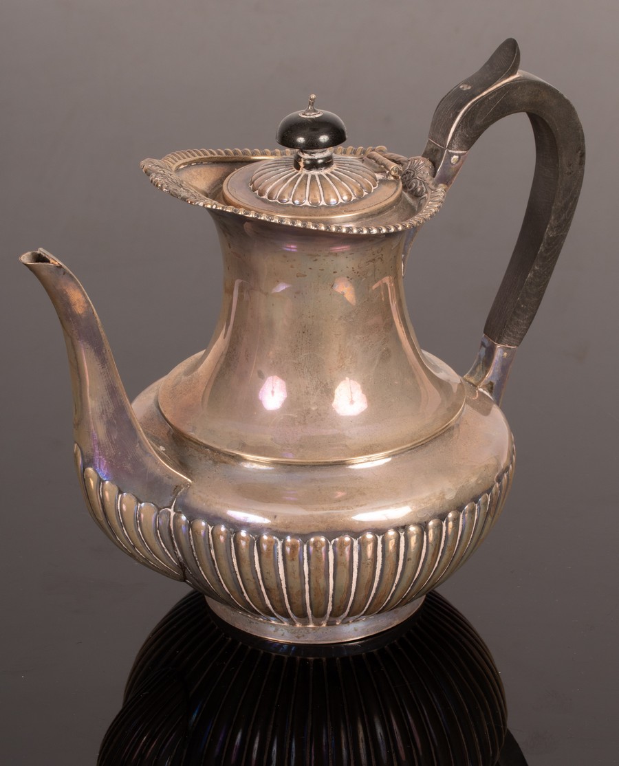 A late Victorian silver hot water jug, London 1893,
