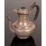 A late Victorian silver hot water jug, London 1893,