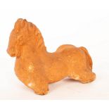 A terracotta figure of a Roman horse,