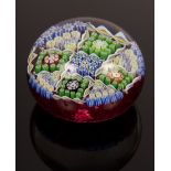 A Perthshire glass paperweight of millefiori design, dated 1979,