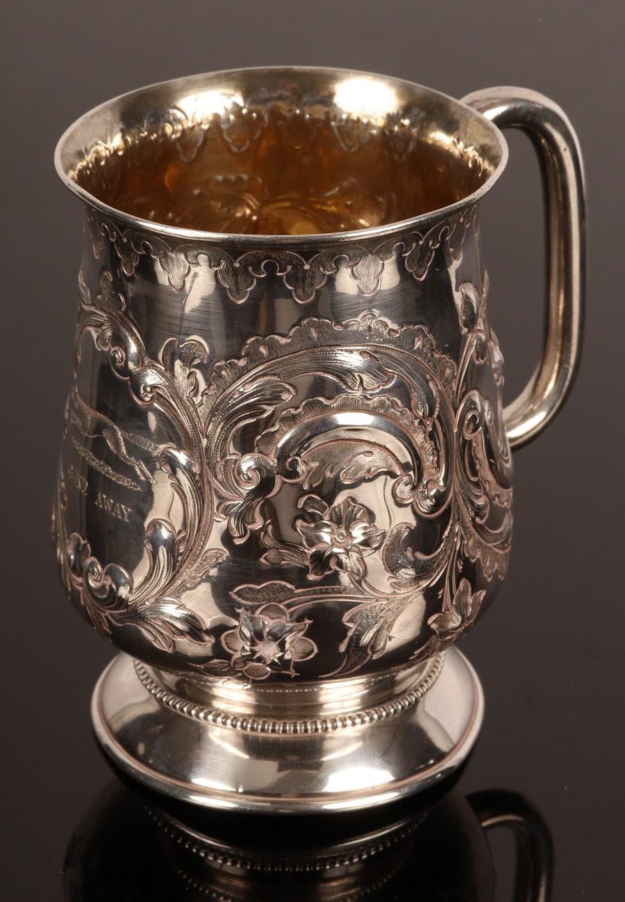 A Victorian silver embossed mug, Hilliard & Thomason, Birmingham 1870,