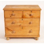 A pine chest of drawers fitted two short over two long drawers, 85cm high, 90cm wide,