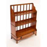 A late 18th Century satinwood waterfall front bookcase,