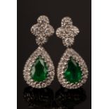 A pair of emerald and diamond cluster earrings, set in 18ct white gold,